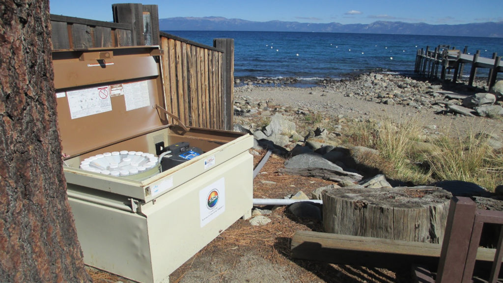Stormwater monitoring control box with Lake Tahoe in background